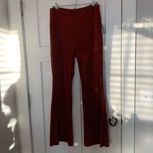 NWT orange flare pants, velvety material